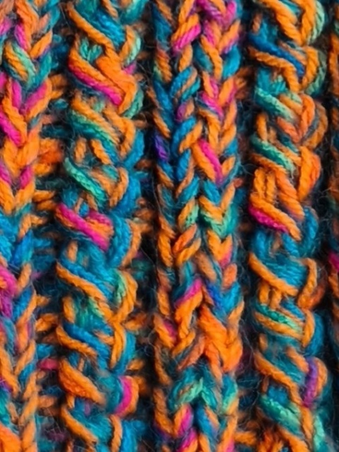 Czapka z pomponem ręcznie robiona na drutach pomarańczowa z niebieskim Czapka z pomponem ręcznie robiona na drutach pomarańczowa z niebieskim